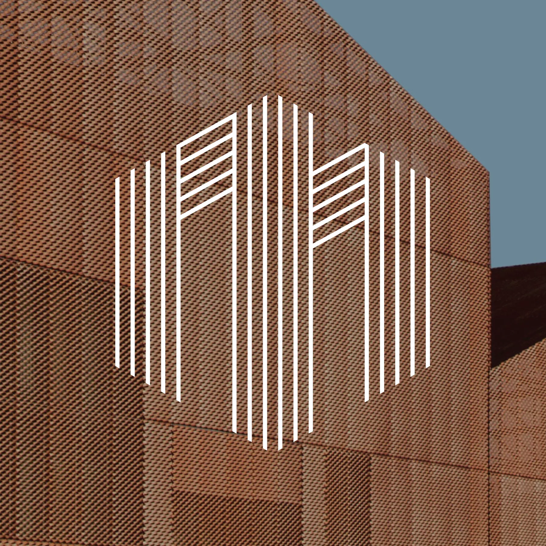 White Magrock logo overlayed on a building