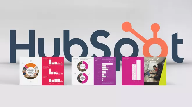Hubspot logo with colourful graphs in the foreground
